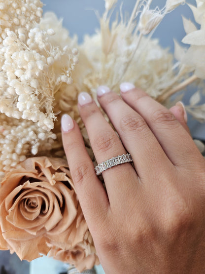 Close-up of Demi wedding ring with diamond accents